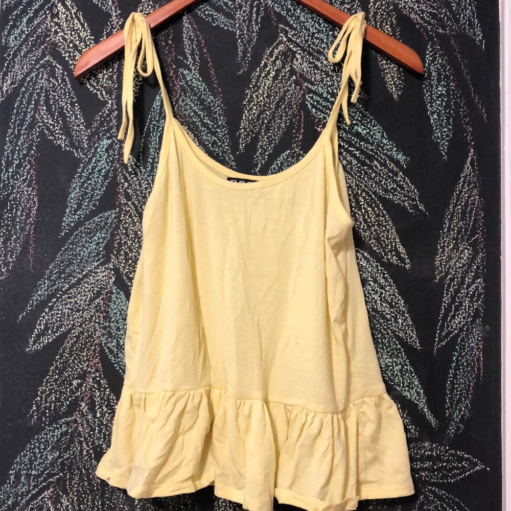 Yellow trefoil camisole with tie straps.
